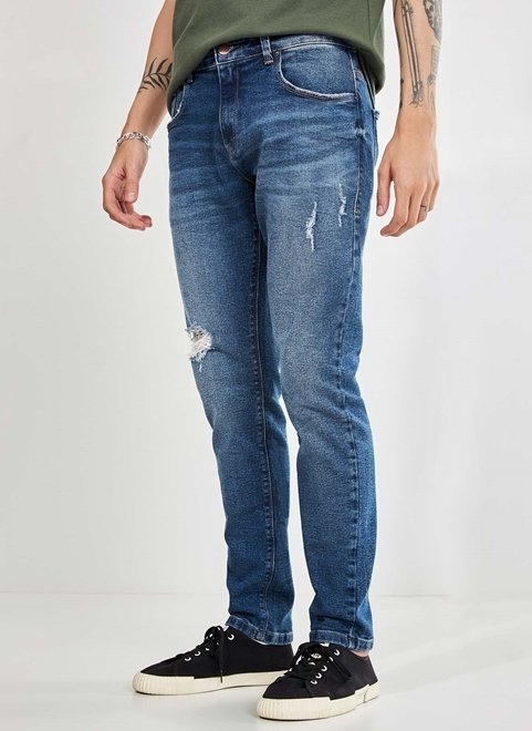 calça skinny jeans com rasgos
