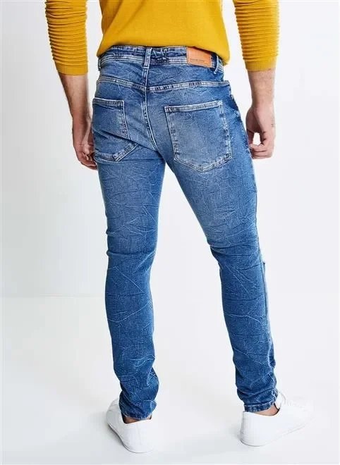 calça super skinny em jeans médio calça super skinny em jeans médio