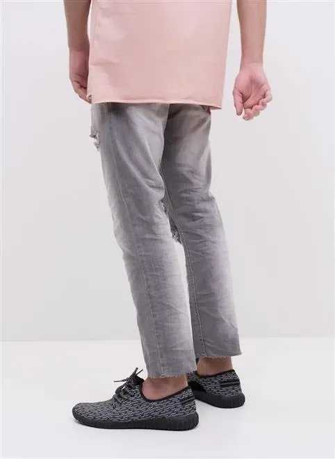 calça skinny destroyed em jeans calça skinny destroyed em jeans