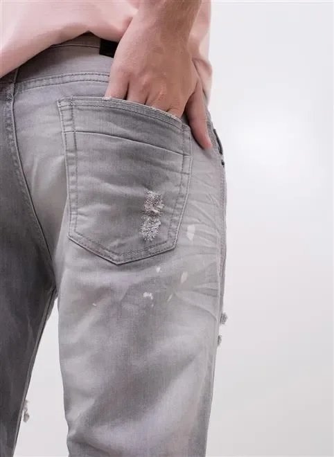 calça skinny destroyed em jeans calça skinny destroyed em jeans