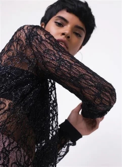 blusa alongada transparente em tule blusa alongada transparente em tule