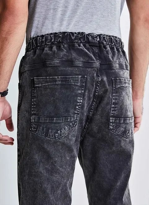 calça jogger em jeans marmorizado calça jogger em jeans marmorizado