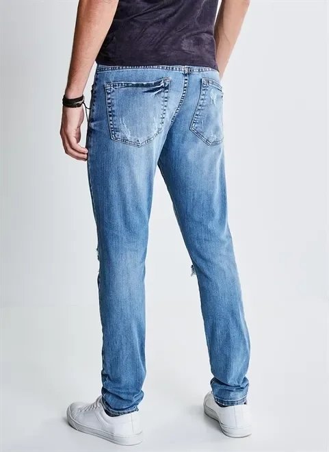 calça skinny jeans com puídos calça skinny jeans com puídos