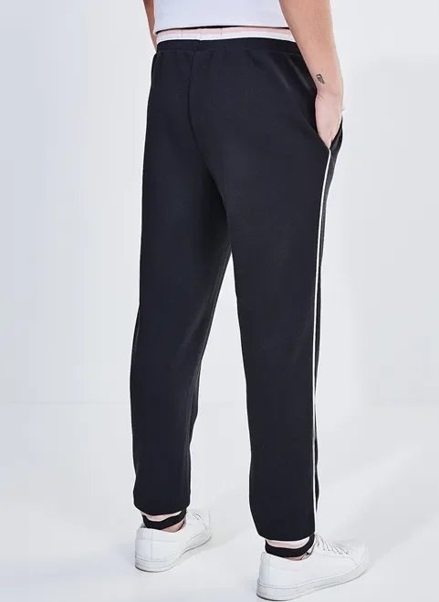 calça em malha preta com detalhes calça em malha preta com detalhes