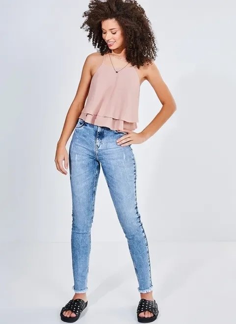 calça skinny com franjinhas em jeans marmorizado calça skinny com franjinhas em jeans marmorizado