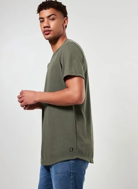 camiseta alongada em malha texturizada camiseta alongada em malha texturizada