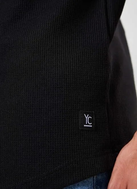 camiseta alongada em malha texturizada camiseta alongada em malha texturizada