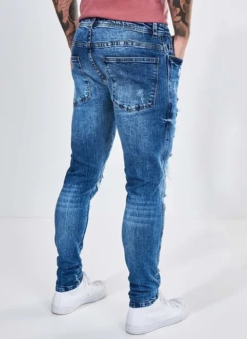 calça jeans super skinny com recorte e rasgos calça jeans super skinny com recorte e rasgos