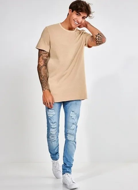 calça super skinny em jeans com puídos calça super skinny em jeans com puídos