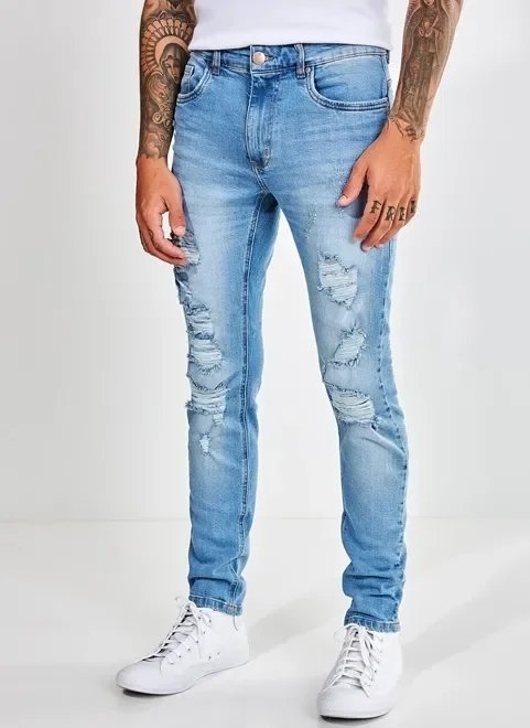 calça super skinny em jeans com puídos calça super skinny em jeans com puídos