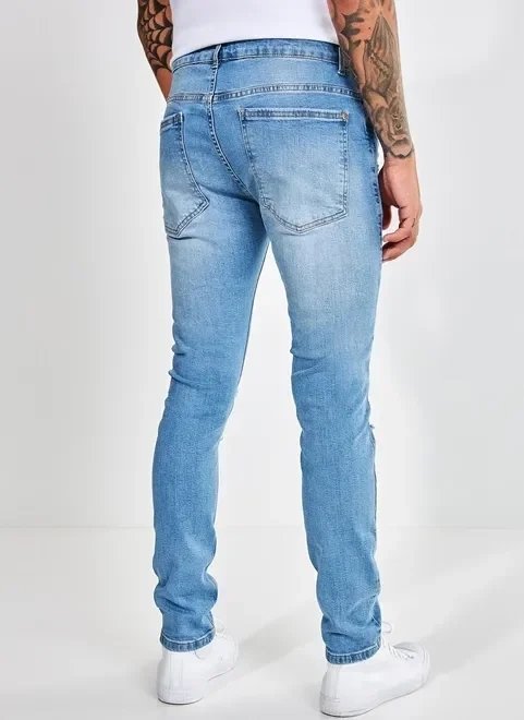 calça super skinny em jeans com puídos calça super skinny em jeans com puídos