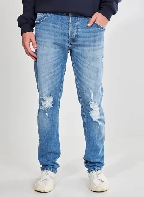 calça slim em jeans desfiado calça slim em jeans desfiado
