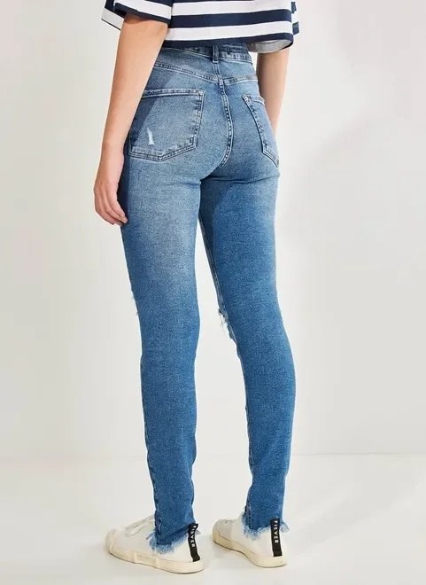 calça jeans skinny desfiada com elastano calça jeans skinny desfiada com elastano