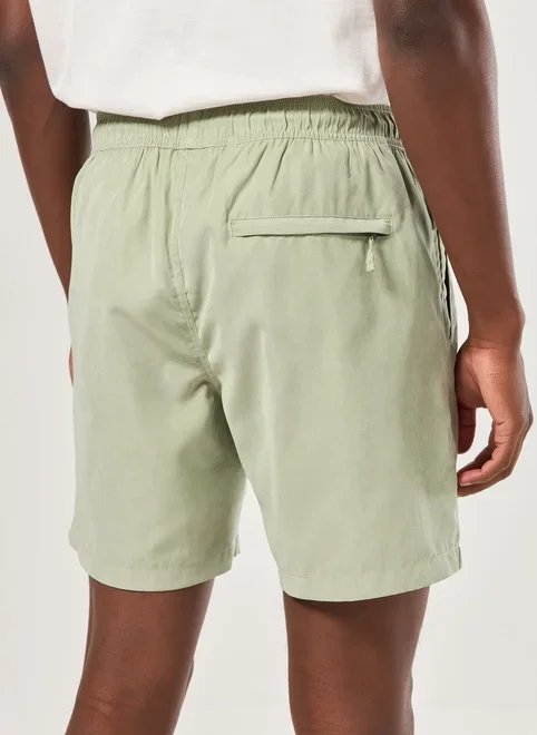 bermuda em tecido estonado bermuda em tecido estonado