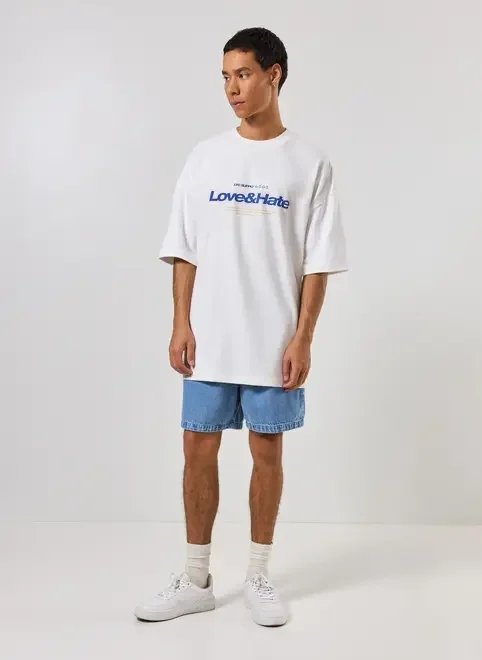 camiseta oversized malhão off-white com escrito camiseta oversized malhão off-white com escrito