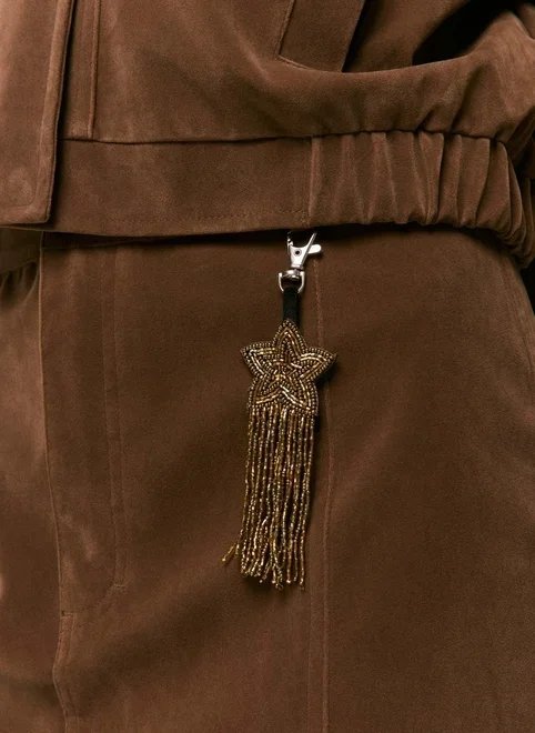 chaveiro estrela bordada com miçangas e franjas chaveiro estrela bordada com miçangas e franjas