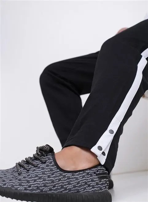 calça malha listra e botões lateral calça malha listra e botões lateral